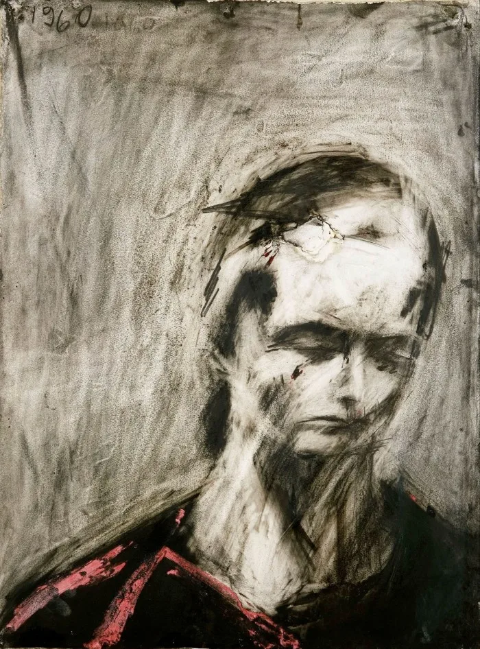 A distorted charcoal black and white sketch of a man’s head and shoulders 