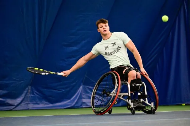 Tomas Majetic returns a serve during practice at the Rocky Mountain Tennis Center in Boulder on Dec. 21. (Matthew Jonas/Staff Photographer)