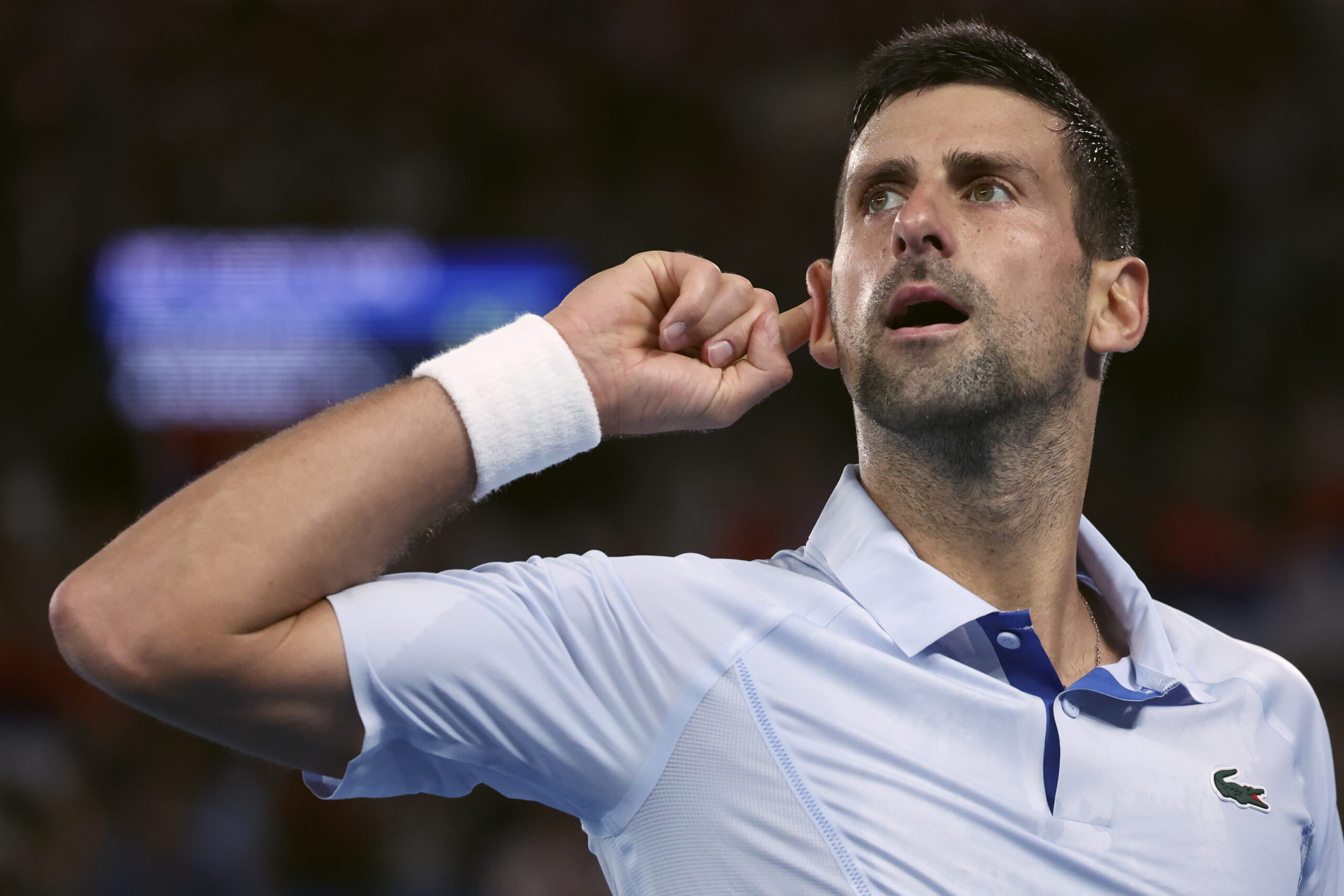 Novak Djokovic responds to heckler by acing tennis serve