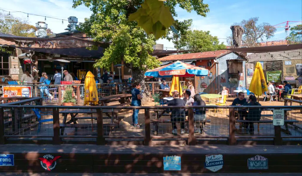 An outdoor patio at a restaurant on a sunny day