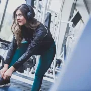 Girl listening music while getting ready to exercise