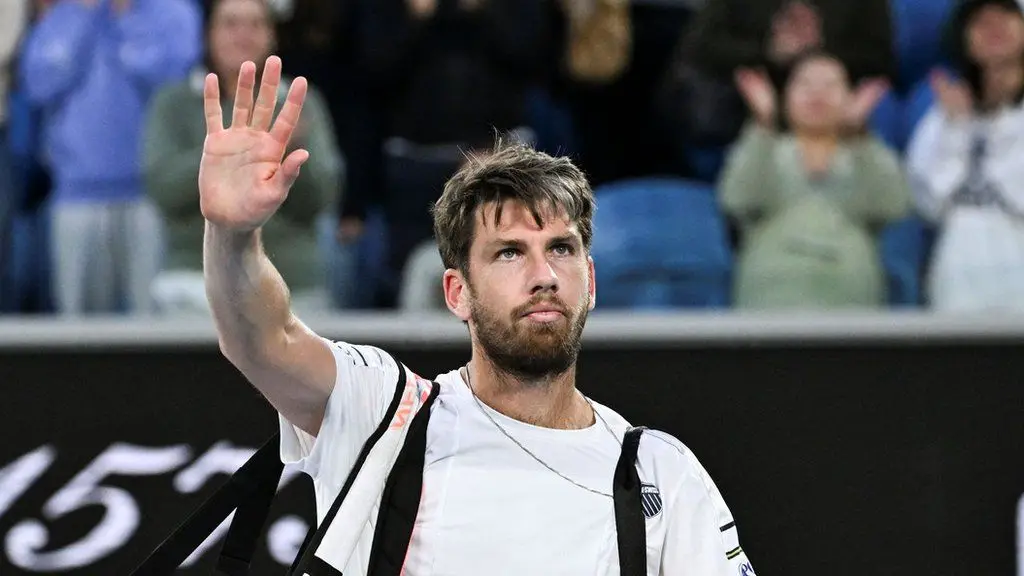 Cameron Norrie waves goodbye to the Melbourne crowd