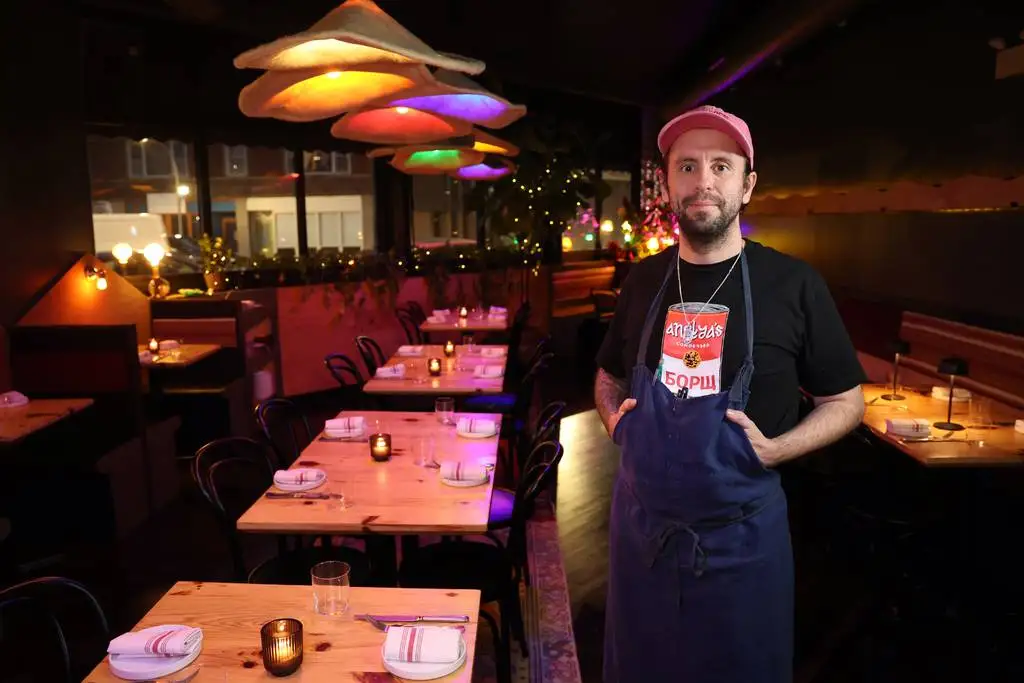 Chef/owner Johnny Clark in the dining room of Anelya, his restaurant on Elston Avenue in Chicago on Dec. 28, 2023.