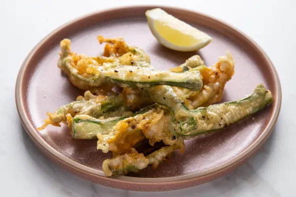 Lightly fried zucchini flowers with a hint of truffle honey.