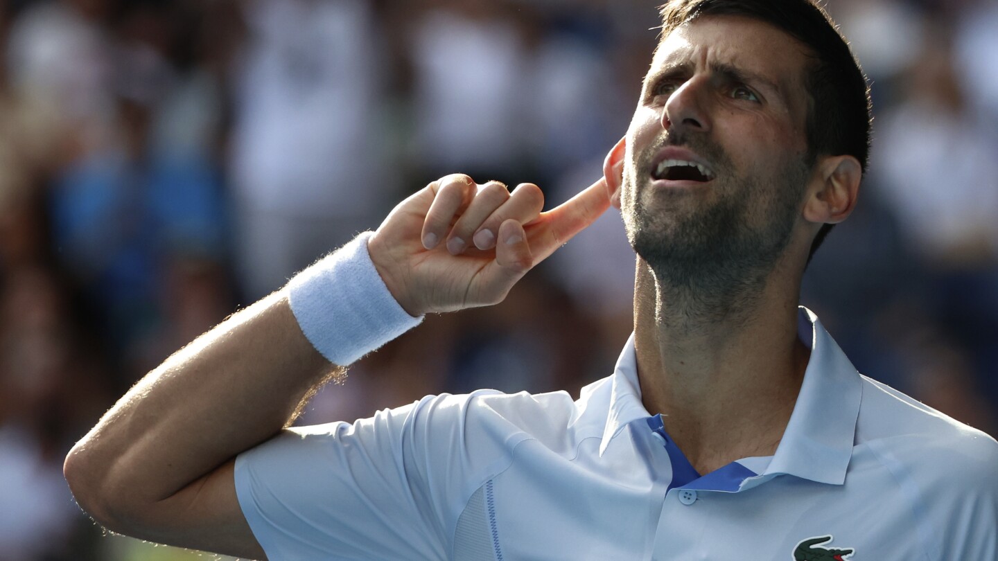 Djokovic holds off Fritz to reach Australian Open semifinals for 11th time