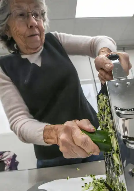 Sandy Hochstetler shaves a zucchini making a black bean and vegetable quesadilla during a Clemson SNAP-ED program Cooking Matters! class, teaching nutrition, recipes, and cooking in a class at Belton Library Tuesday, January 23, 2024.