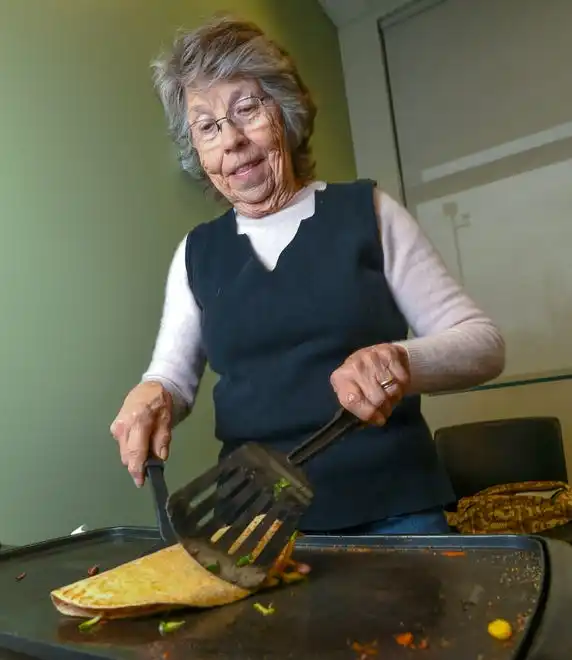 Sandy Hochstetler and other participants make black bean and vegetable quesadillas during a Clemson SNAP-ED program Cooking Matters! class, teaching nutrition and recipes in a class at Belton Library Tuesday, January 23, 2024.