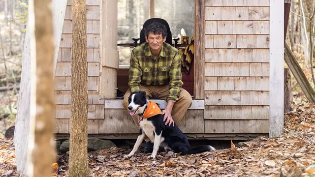 Ken Cadow and his dog, Quinnie - JUSTIN CASH