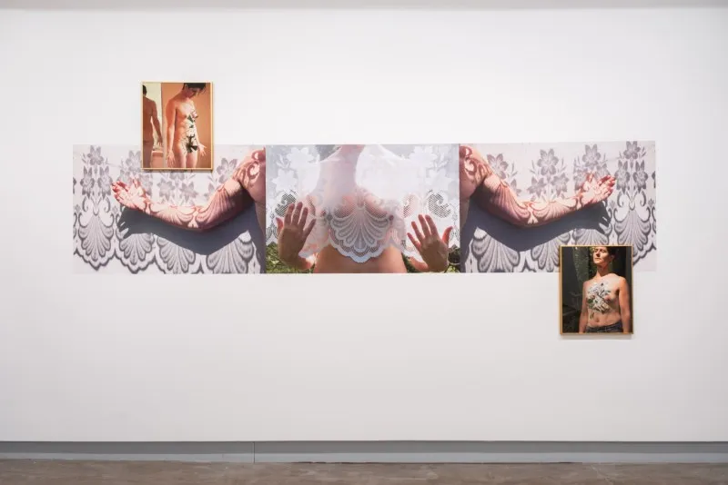 Ebenezer Galluzzo. Installation view (Left to Right): There is a Crack in Everything. 2023. Pigment print with inkjet underlay and archival adhesive; Open to Your Inheritance. 2020. Vinyl.; Let the Knives become wings. 2021. Pigment print. Image courtesy of Blue Sky.