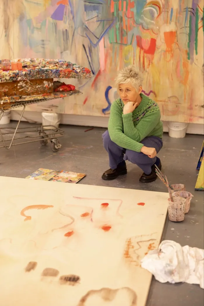 Lorna Robertson in her studio, surrounded by works in progress