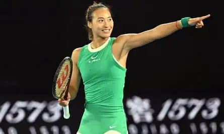 Zheng Qinwen celebrates winning match point during her quarter-final match against Anna Kalinskaya.