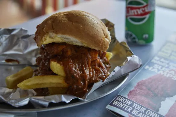 Chip butty with butter chicken gravy.