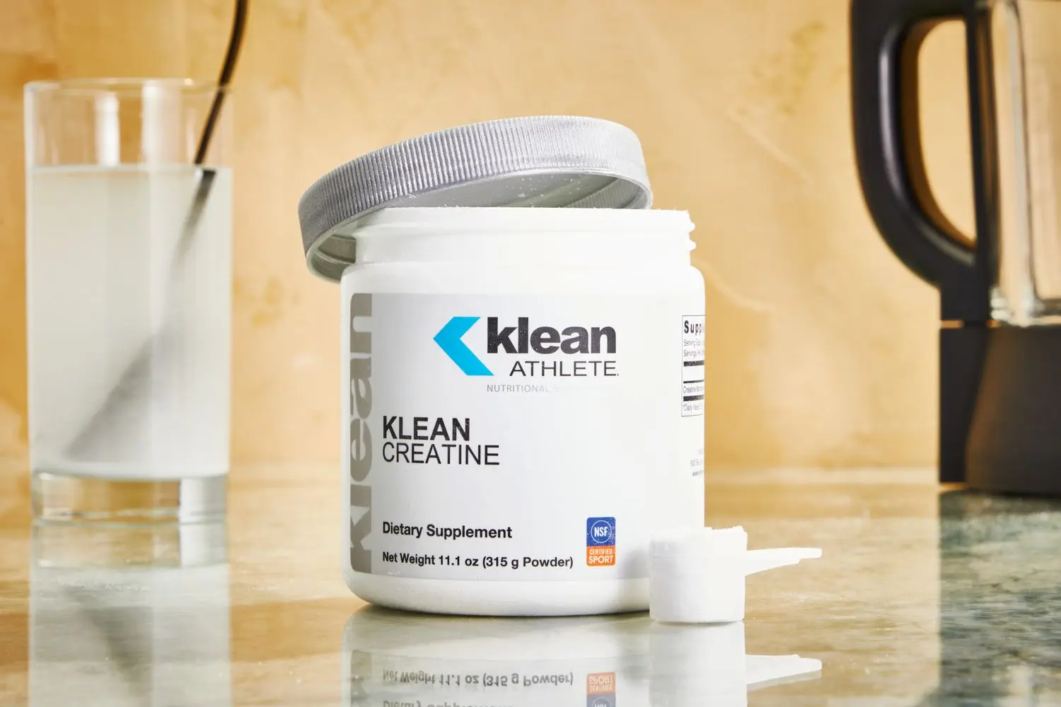 A jar of Klean Athlete Klean Creatine