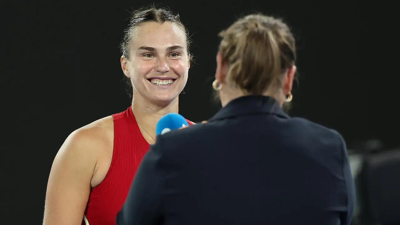 Aryna Sabalenka interviewed by Jelena Dokic. Photo by Cameron Spencer/Getty Images.