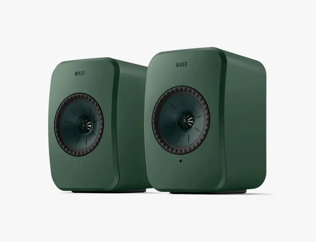 a couple of green and black speakers