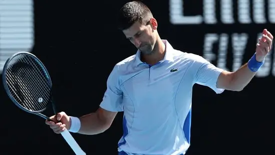 Serbia's Novak Djokovic reacts on a point against Italy's Jannik Sinner during their men's singles semi-final match on day 13 of the Australian Open tennis tournament in Melbourne on January 26(AFP)