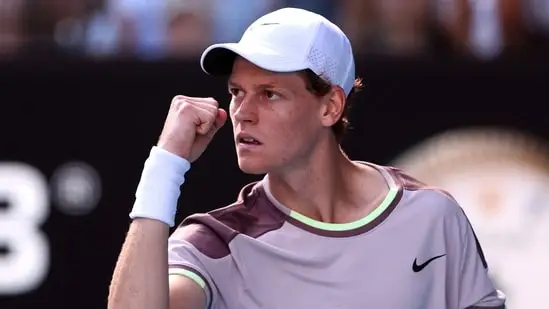 Italy's Jannik Sinner reacts on a point against Serbia's Novak Djokovic during their men's singles semi-final match of the Australian Open(AFP)