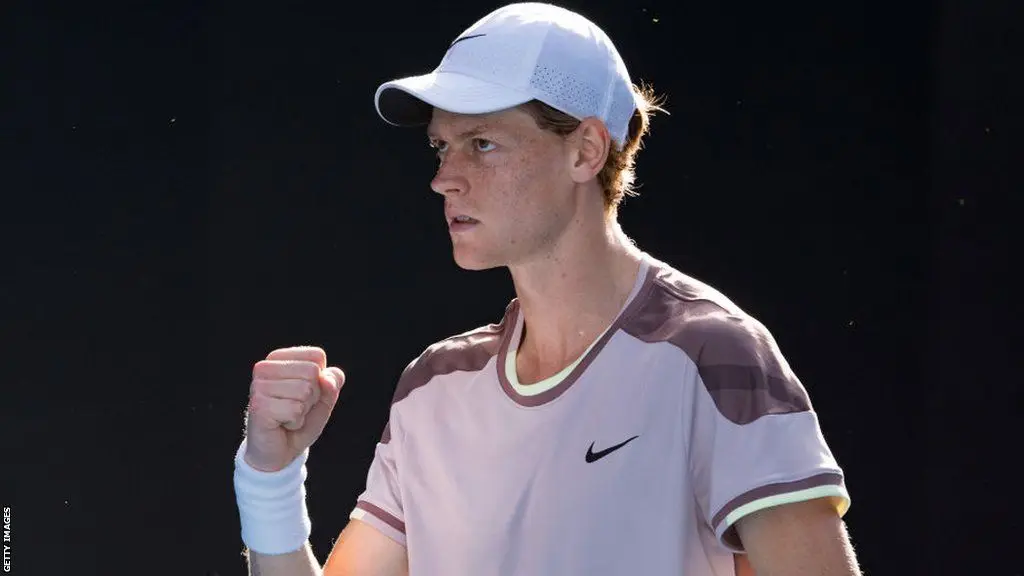 Jannik Sinner celebrates victory over Novak Djokovic at the Australian Open