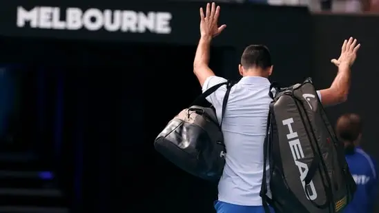 Serbia's Novak Djokovic walks off the court after losing against Italy's Jannik Sinner during their men's singles semi-final match on day 13 of the Australian Open tennis tournament in Melbourne on January 26(AFP)