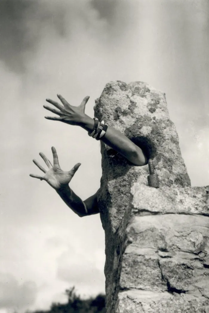 Arms coming out stone