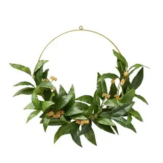 A faux fur laurel leaf wreath