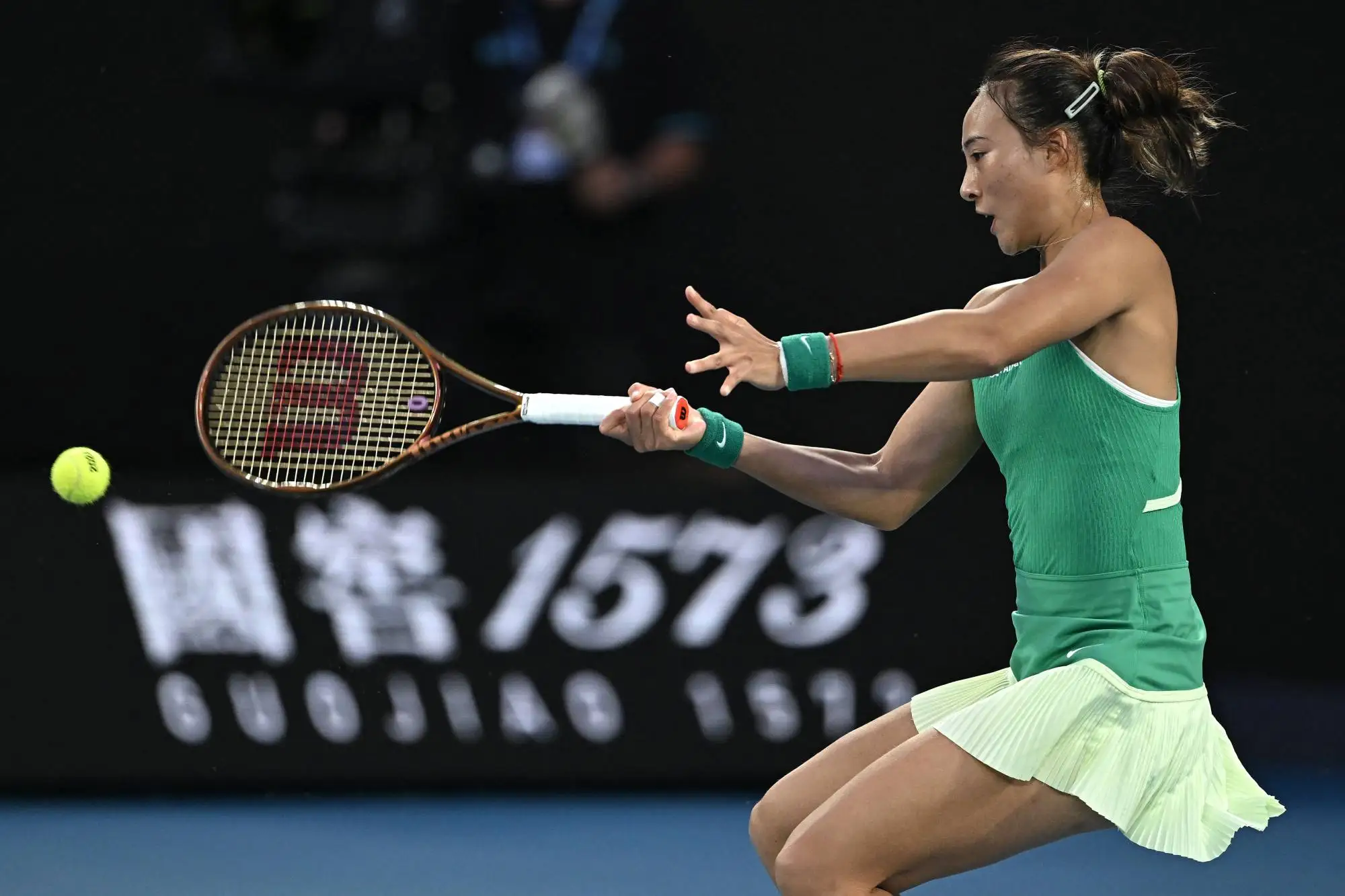 China’s Zheng Qinwen hits a return against Aryna Sabalenka during their final. Photo: AFP