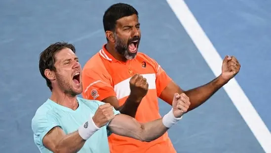 India's Rohan Bopanna (R) and Australia's Matthew Ebden celebrate after victory against Italy's Simone Bolelli and Andrea Vavassori during their men's doubles final match on day 14 of the Australian Open.(AFP)