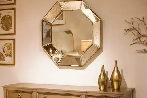 Mirrors amplify space and are perfect to reflect light and keep the interiors well-illuminated. Place them at strategic points to enhance the lighting effect