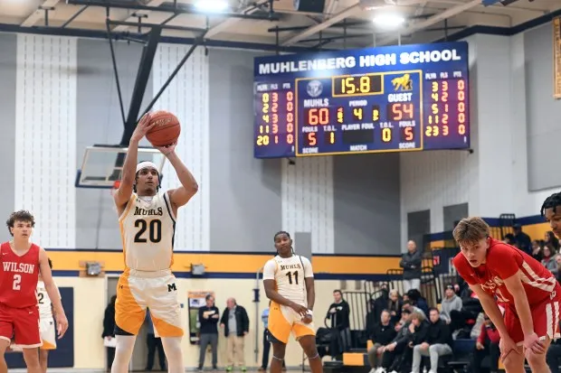 Foul shots by Muhlenberg's Alex Collado puts the game away against Wilson on Monday in Laureldale. (BILL UHRICH - READING EAGLE)