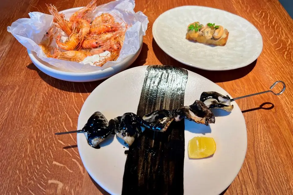 Connemara shrimps, mussel rosti, squid with black ink. Photo: Lucinda O'Sullivan