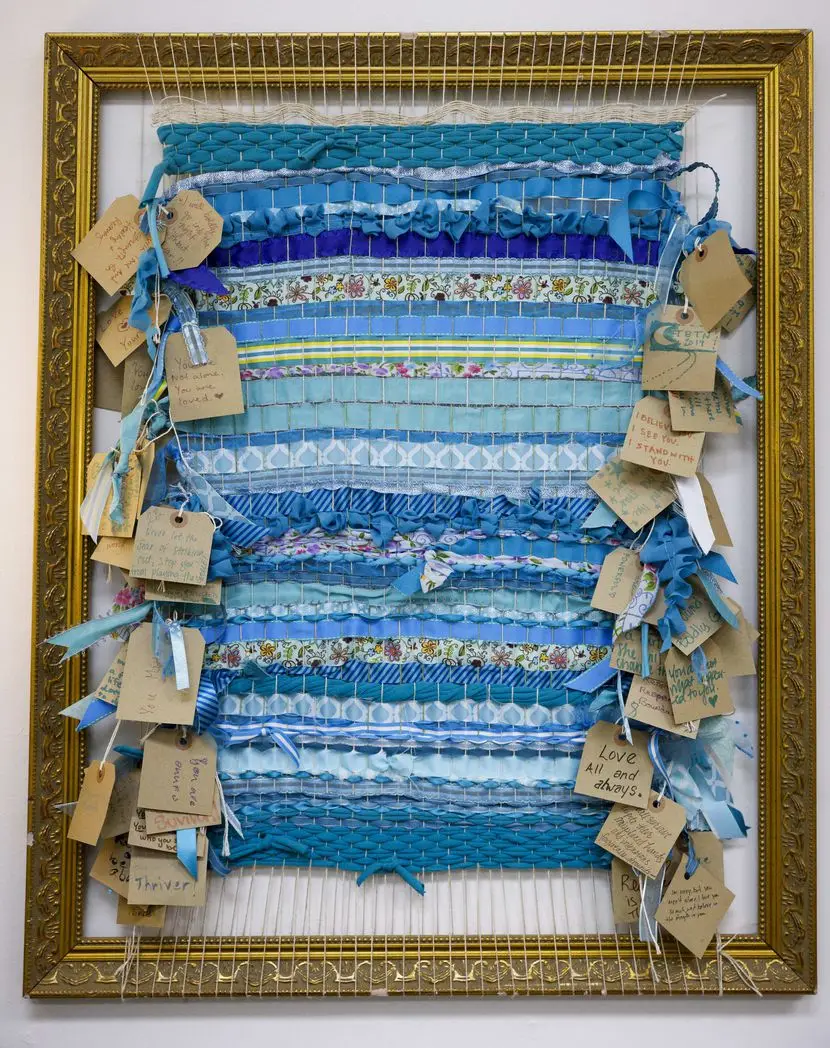 The first community art project completed by The Art Room, a nonprofit art studio, Monday,...
