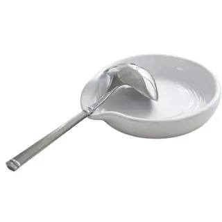 White circular spoon rest