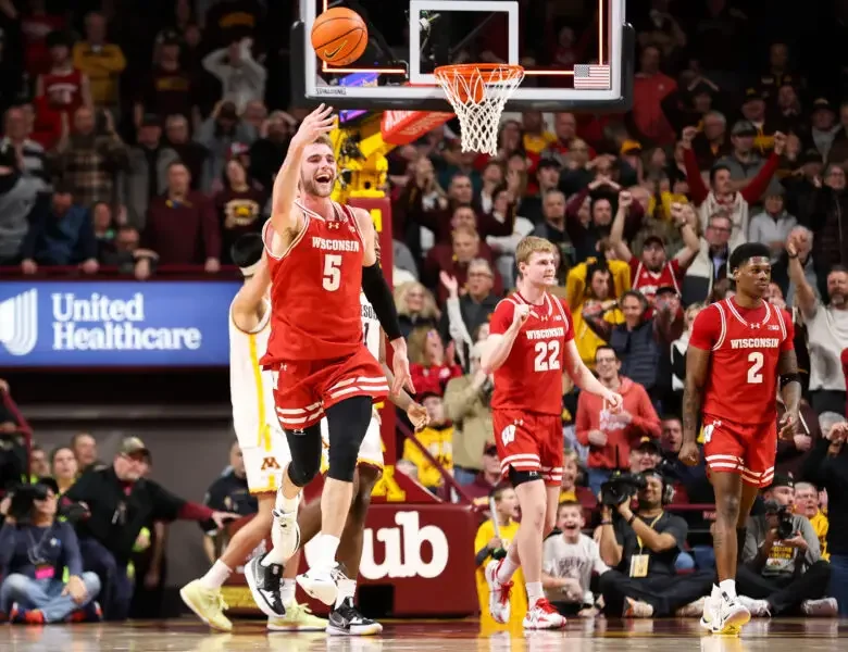 Wisconsin basketball forward Tyler Wahl celebrates a win over the rival Minnesota Gophers. The Big Ten will determine two-play opponents, in part, with consideration of rivalries.