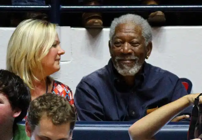 Jan 29, 2013; Memphis, TN, USA; Professional actor Morgan Freeman (left) attends the game between the Mississippi Rebels and the Kentucky Wildcats at the Tad Smith Coliseum. Mandatory Credit: Spruce Derden–USA TODAY Sports