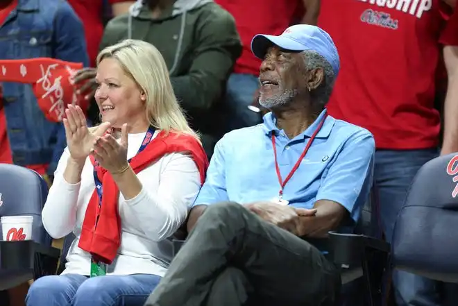 Jan 31, 2017; Oxford, MS, USA; Morgan Freeman (right) attends the game between the Mississippi Rebels and the Mississippi State Bulldogs at The Pavilion at Ole Miss. Mississippi defeated Mississippi State 88-61. Mandatory Credit: Spruce Derden-USA TODAY Sports