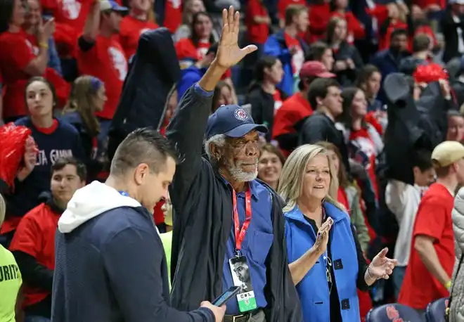 Feb 5, 2020; Oxford, Mississippi, USA; Morgan Freeman (middle) waves to fans after a game between the South Carolina Gamecocks and the Mississippi Rebels, on Morgan Freeman Night at The Pavilion at Ole Miss. Mandatory Credit: Petre Thomas-USA TODAY Sports