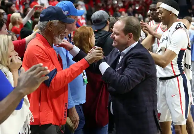 Mar 4, 2020; Oxford, Mississippi, USA; Mississippi Rebels head coach Kermit Davis celebrates with Morgan Freeman after beating the Missouri Tigers at The Pavilion at Ole Miss. Mandatory Credit: Petre Thomas-USA TODAY Sports