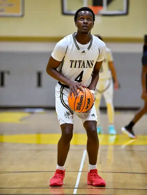 Treasure Coast's Wood Pierre (4) attempts a free throw in a boys high school basketball game against Okeechobee, Tuesday, Jan. 30, 2024, in Port St. Lucie.