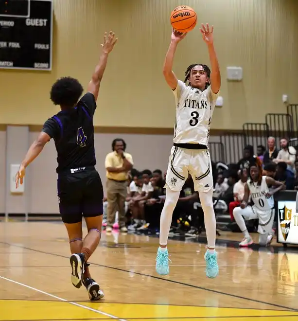 Treasure Coast's Tyson Wilson (3) makes a 3-point basket in a boys high school basketball game against Okeechobee, Tuesday, Jan. 30, 2024, in Port St. Lucie.