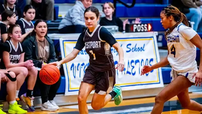 Westport's Julia George presses the attack.