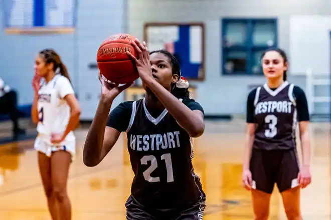 Westport's Jenna Egby takes the free throw.