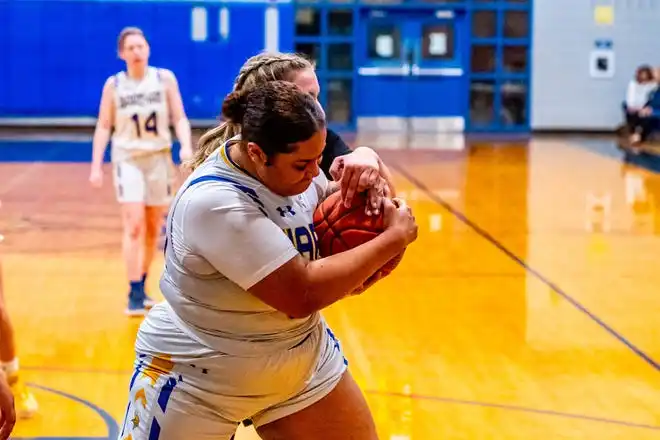 Wareham's Rianna Phillips battles for the offensive rebound.