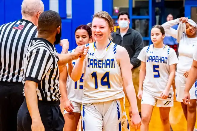 Wareham's Johnny Tompkins fist bumps the refs.