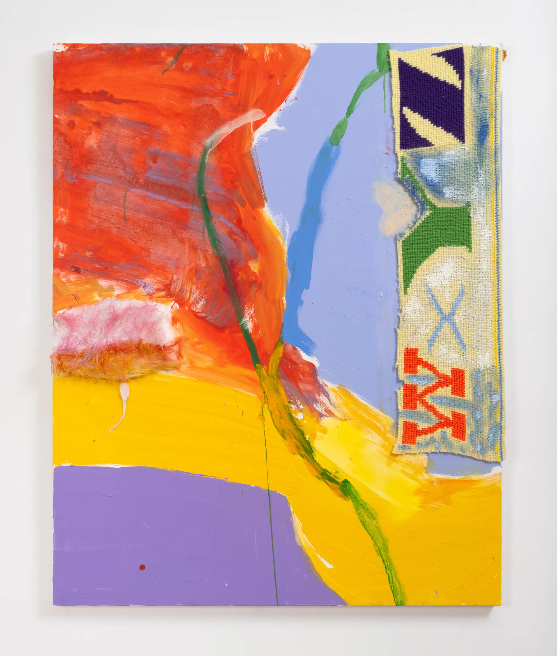 A colorful painting with cloth letters embedded in it