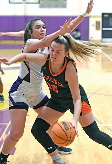 The area varsity girls basketball teams will end their regular season as Booker will host IMG Academy Blue Wed. Jan. 31, 2024, 7p.m. at Booker's Tornado Alley and the Sarasota Sailors will host the Cardinal Mooney Cougars at 6:00 p.m. on Friday Feb. 2, 2024, at Sarasota's Edward F. Howell Gymnasium. Here action between Booker and Sarasota. Booker took a two point lead in the last 38.4 seconds of remaining regulation play winning 56-54 on Thursday night Jan. 18, 2024, at Booker's Tornado Alley in Sarasota.