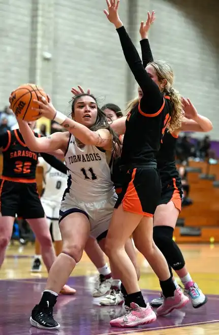 The area varsity girls basketball teams will end their regular season as Booker will host IMG Academy Blue Wed. Jan. 31, 2024, 7p.m. at Booker's Tornado Alley and the Sarasota Sailors will host the Cardinal Mooney Cougars at 6:00 p.m. on Friday Feb. 2, 2024, at Sarasota's Edward F. Howell Gymnasium. Here action between Booker and Sarasota. Booker took a two point lead in the last 38.4 seconds of remaining regulation play winning 56-54 on Thursday night Jan. 18, 2024, at Booker's Tornado Alley in Sarasota.