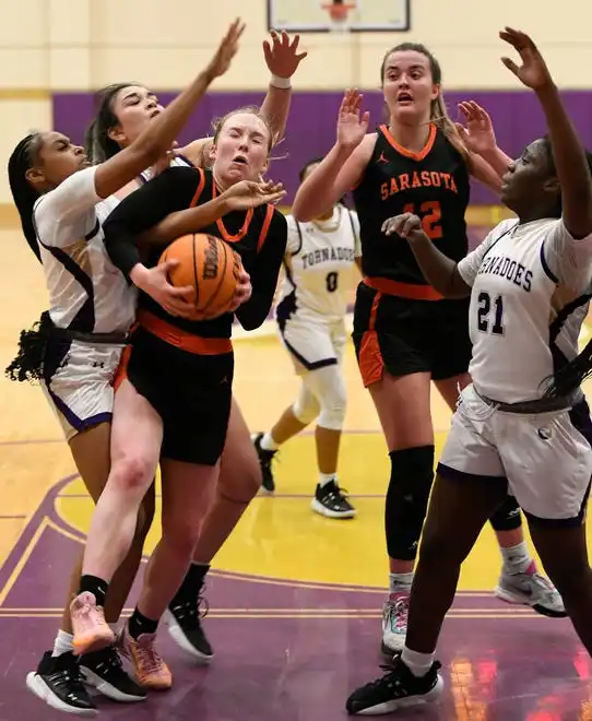 The area varsity girls basketball teams will end their regular season as Booker will host IMG Academy Blue Wed. Jan. 31, 2024, 7p.m. at Booker's Tornado Alley and the Sarasota Sailors will host the Cardinal Mooney Cougars at 6:00 p.m. on Friday Feb. 2, 2024, at Sarasota's Edward F. Howell Gymnasium. Here action between Booker and Sarasota. Booker took a two point lead in the last 38.4 seconds of remaining regulation play winning 56-54 on Thursday night Jan. 18, 2024, at Booker's Tornado Alley in Sarasota.