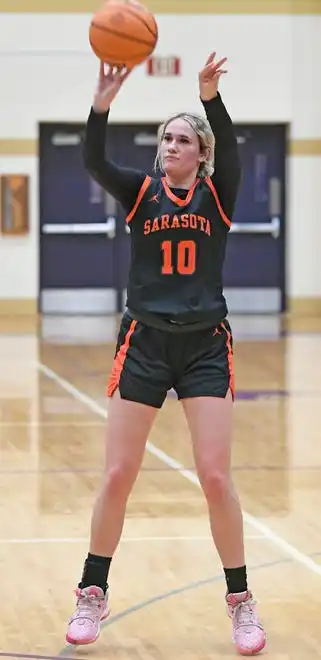 Sarasota's Kennedy McClain (#10) shoot against Booker at Tornado Alley in Sarasota.