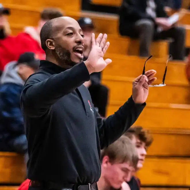 Homestead head coach Sean Crider gestures from the sideline during the game at Hartford, Tuesday, Jan. 30, 2024. Homestead won 93-66.