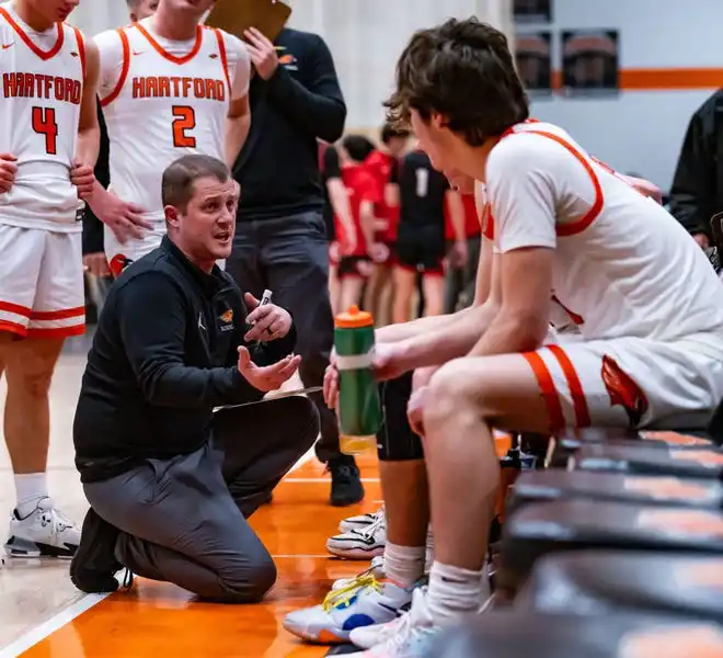 Hartford head coach Chris Smith talks with players during the game at home against Homestead, Tuesday, Jan. 30, 2024. Homestead won 93-66.